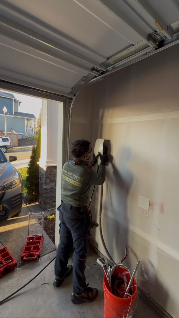 Licensed electrician installing EV charger in Seattle home